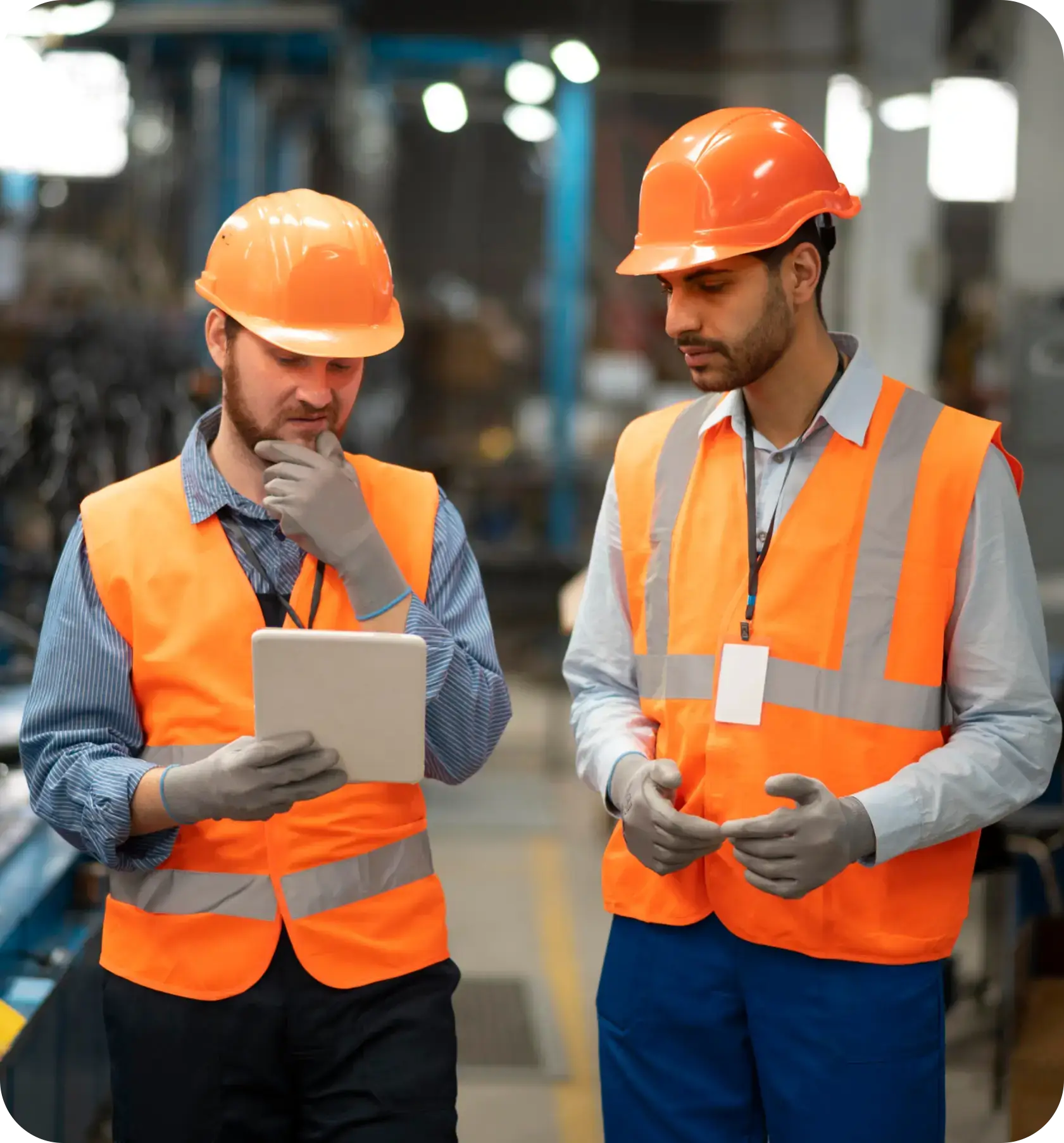 Image showing two people reviewing VLX's digital quality software